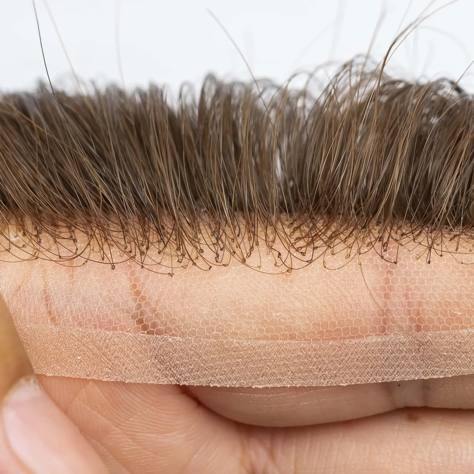 Close-up of a lace front and visible hair attachments